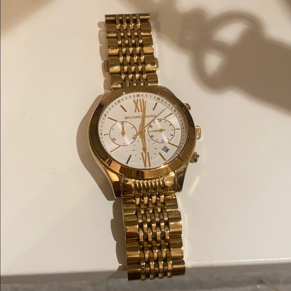 Gold colour watch